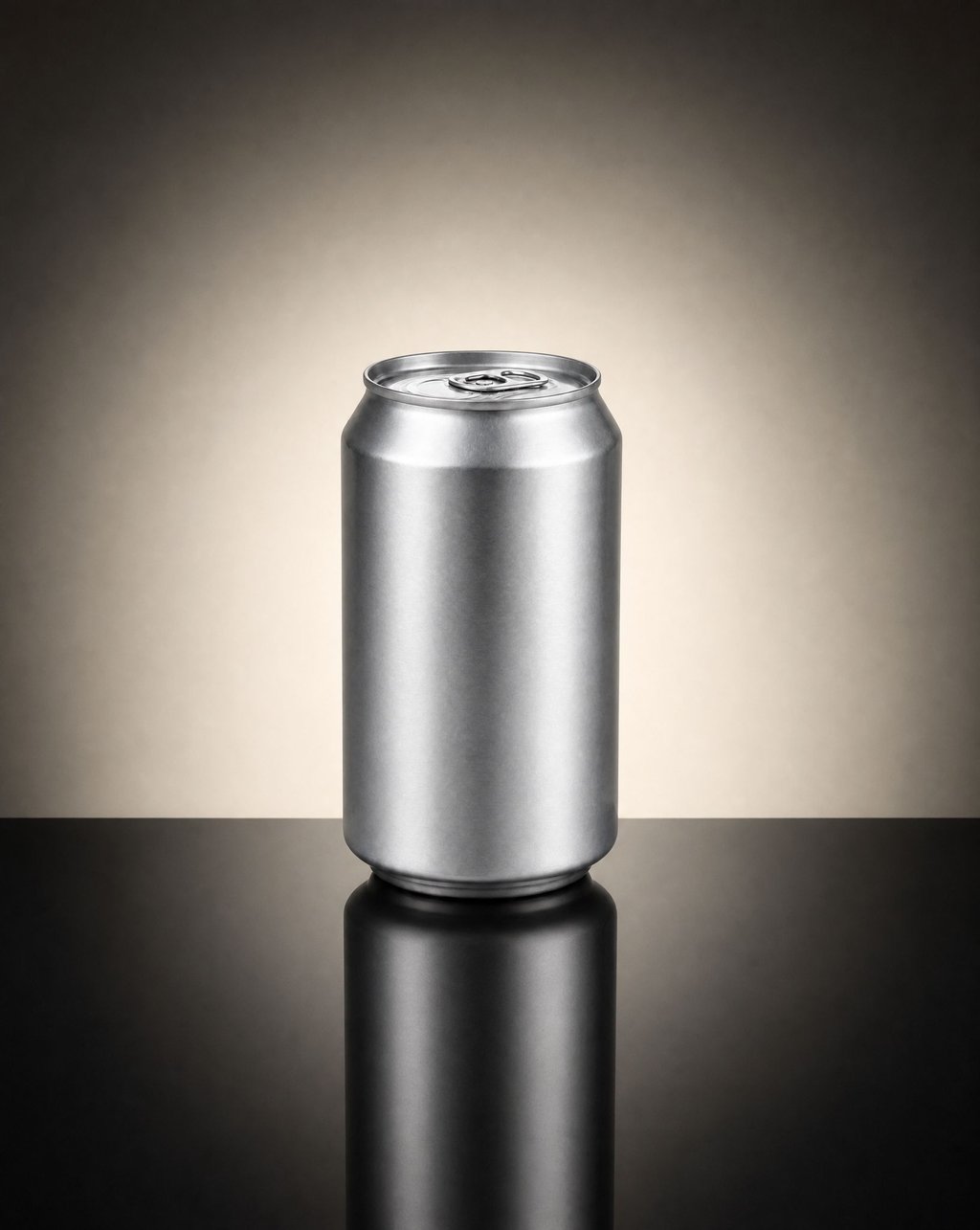 Silver aluminum beverage can staged in a soft centered vignette with dark falloff at the edges