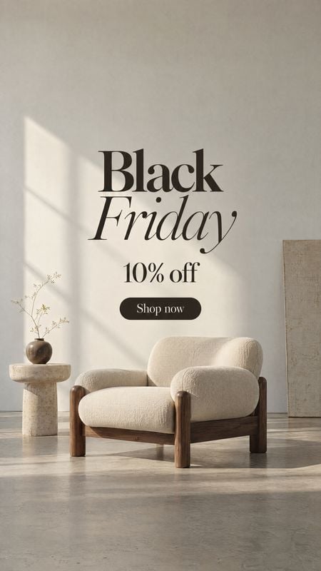 upholstered armchair room set product photo: A sculptural cream-upholstered armchair sits in a quiet, sunlit minimalist interior beneath prominent Black Friday…