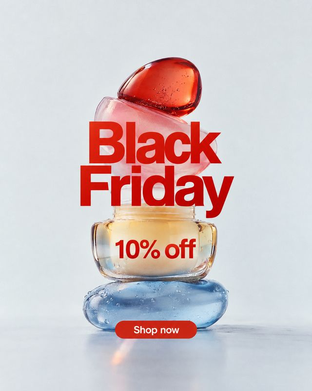 perfume bottle beauty product photo: A sculptural perfume bottle is staged against a cool pale studio background beneath bold red Black Friday and discount let…