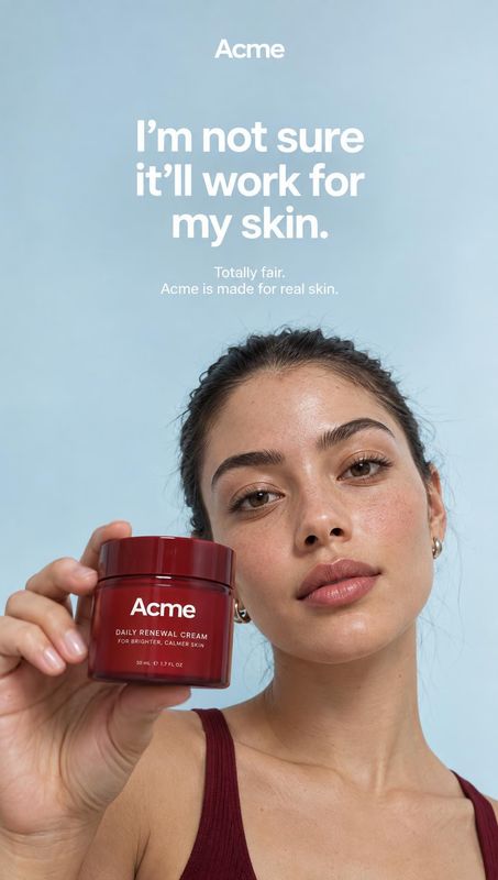 daily renewal cream product in hand product photo: A woman with natural makeup holds a red skincare cream jar close to her face against a pale blue studio back…