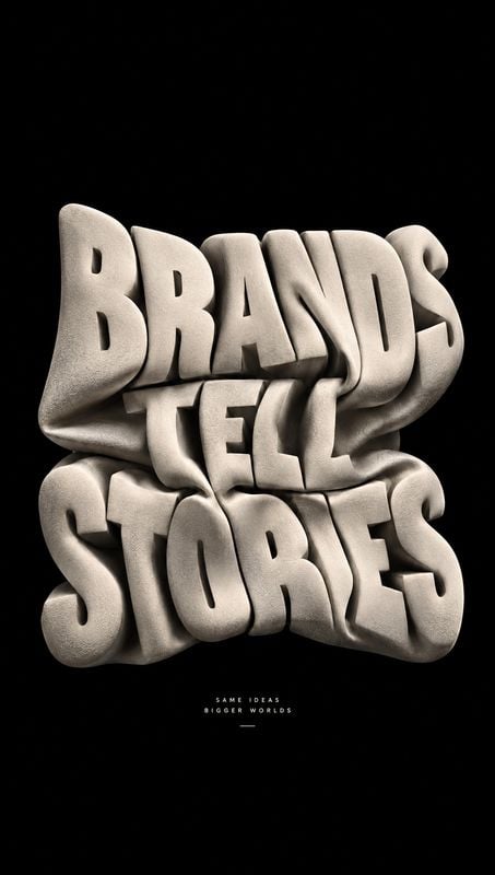posters product photo: Sculptural, stone-textured lettering reading “BRANDS TELL STORIES” fills a black field, with small supporting text below for a bold, dra…