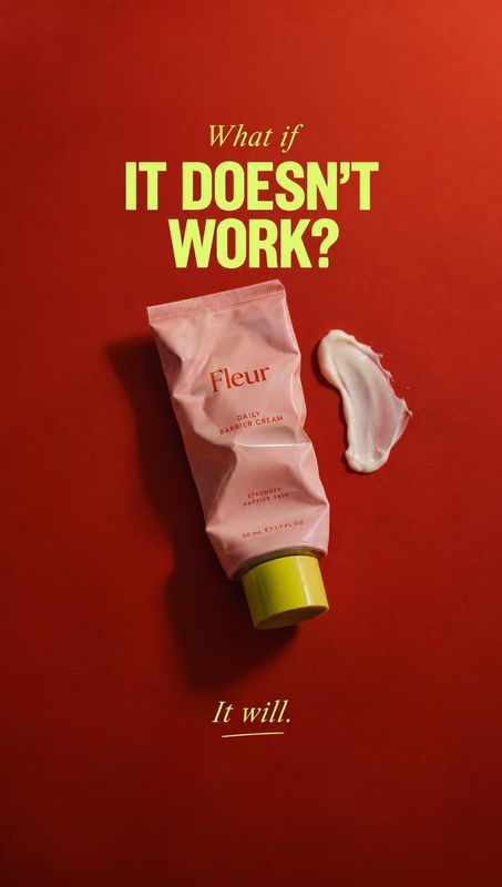 barrier cream still life product photo: A pink barrier-cream tube and a swipe of cream sit on a vivid red studio surface beneath bold lime headline text, creat…