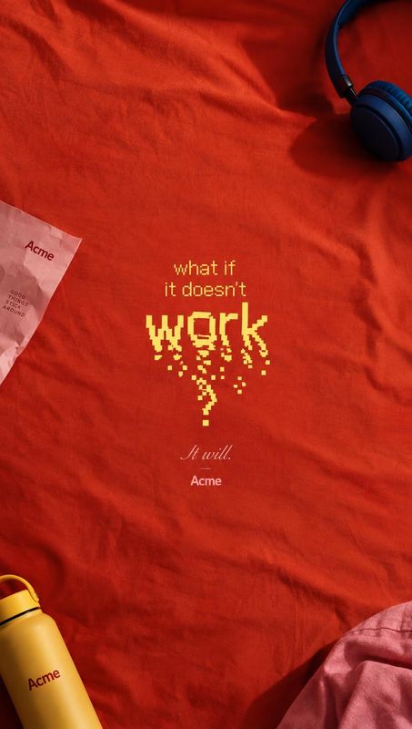 printed T-shirt flat lay product photo: A red slogan-printed T-shirt is styled in a top-down arrangement with headphones, a yellow bottle and fabric accents, u…