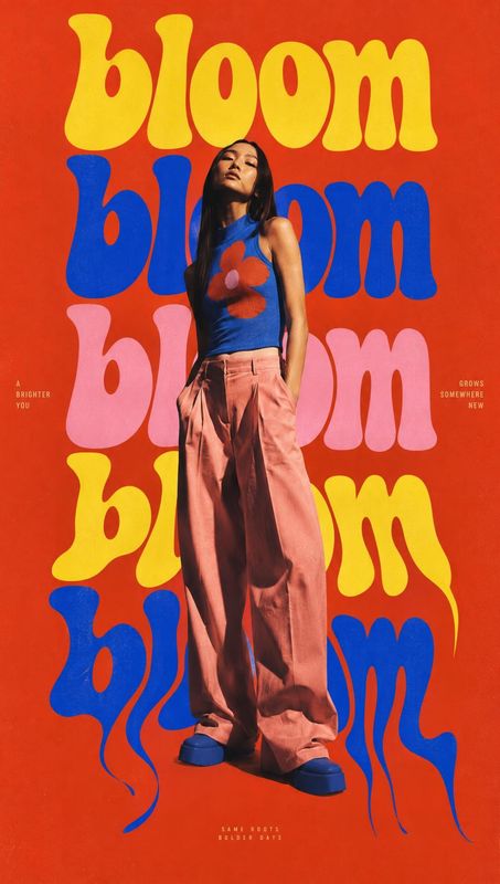 fashion outfit look book product photo: A model poses in a blue floral top, loose pink trousers and platform shoes against a vivid red backdrop layered with ov…