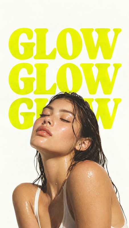 beauty close-up product photo: A wet-haired model poses with closed eyes against a bright white background, framed by oversized neon-yellow “GLOW” typography f…
