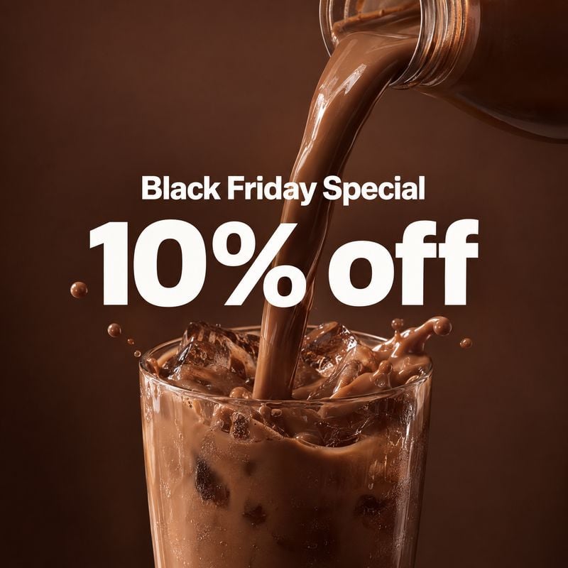 iced chocolate drink food and drink product photo: A stream of glossy chocolate pours into an ice-filled glass against a warm brown studio backdrop, with bold…
