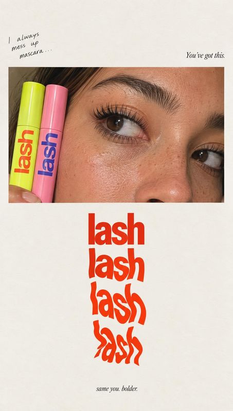mascara beauty close-up product photo: A close-up of a woman’s eyes beside bright pink and yellow mascara tubes, framed by playful red typography on a warm cre…