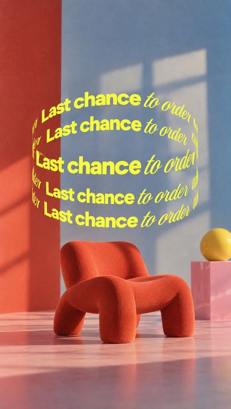 upholstered chair still life product photo: A sculptural orange upholstered chair sits in a sunlit pastel studio set beneath looping yellow “Last chance to ord…