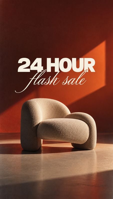 upholstered lounge chair room set product photo: A sculptural beige upholstered lounge chair sits in a warm, rust-toned interior, lit by a dramatic shaft of su…