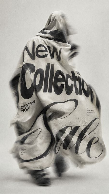 fashion apparel black friday product photo: A hooded figure wrapped in oversized printed fabric stands against a pale studio backdrop, with motion blur and bol…