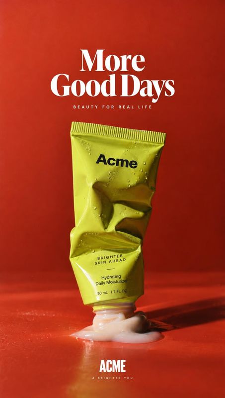 daily moisturizer still life product photo: A crumpled lime-green moisturizer tube stands in a small pool of cream against a vivid red studio backdrop, with bo…