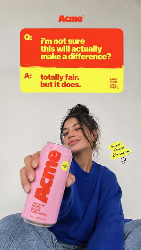 canned beverage product in hand product photo: A woman in a blue sweater presents a pink beverage can toward the camera beneath bold red-and-yellow Q&A typogra…