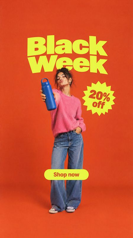 blue water bottle sports product photo: A woman in a pink sweater and jeans presents a blue water bottle against a vivid orange studio backdrop, with bold yell…