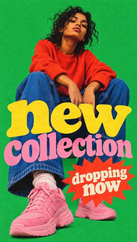 pink sneakers fashion product photo: A seated model in a red sweatshirt, blue jeans, and pink sneakers poses against a vivid green studio backdrop beneath bold…