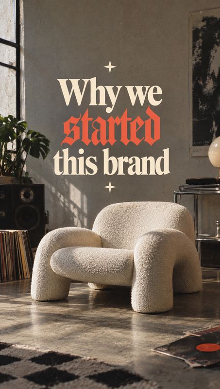 upholstered lounge chair room set product photo: A sculptural cream bouclé lounge chair sits in a warmly lit vintage-style living room beneath bold cream and r…