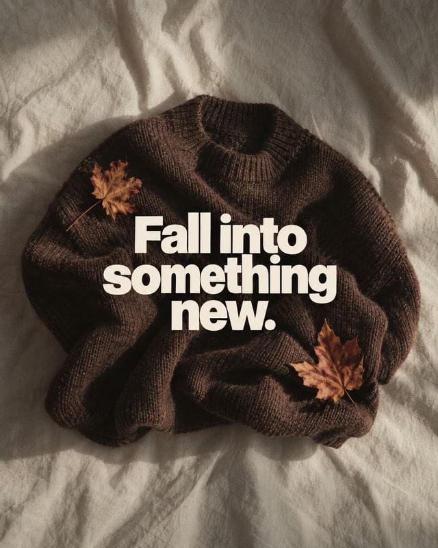 knit sweater autumn product photo: A dark brown knit sweater lies among autumn leaves on softly rumpled cream fabric, with bold cream seasonal lettering creati…