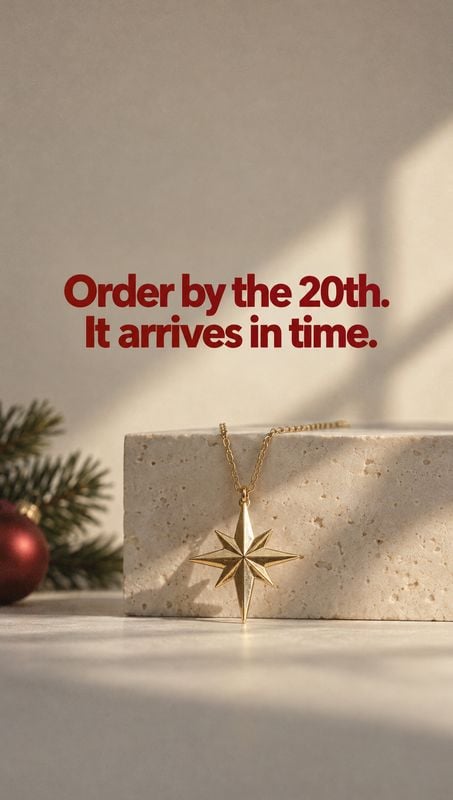 gold star pendant necklace jewelry product photo: A gold star pendant necklace hangs against a pale stone block beneath bold red delivery messaging, with soft…