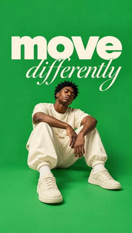 sneakers fashion product photo: A seated model in cream streetwear and sneakers poses against a vivid green studio backdrop beneath oversized “move differently…
