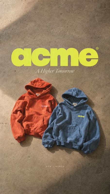 hoodies flat lay product photo: Two brightly colored hoodies are arranged on sunlit concrete beneath bold lime typography, creating a youthful launch-ad mood.