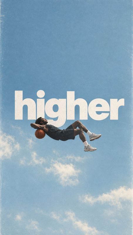action & motion product photo: A basketball player floats against a wide, cloud-dappled blue sky beneath oversized cream “higher” lettering, creating an uplift…