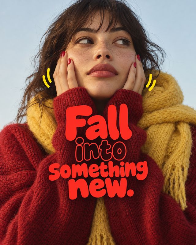 red sweater and yellow scarf autumn product photo: A woman in a chunky red sweater and mustard-yellow scarf looks off-camera against a pale sky, with bold red…