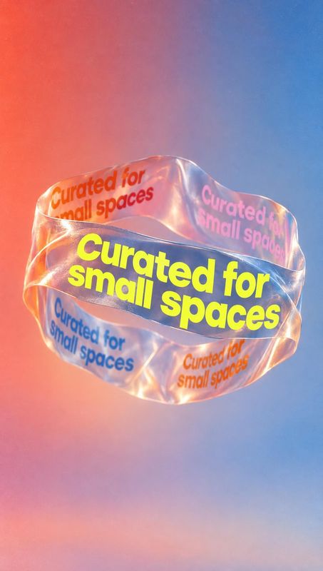 translucent wristband floating product product photo: A translucent looped wristband printed with colorful “Curated for small spaces” lettering floats against…