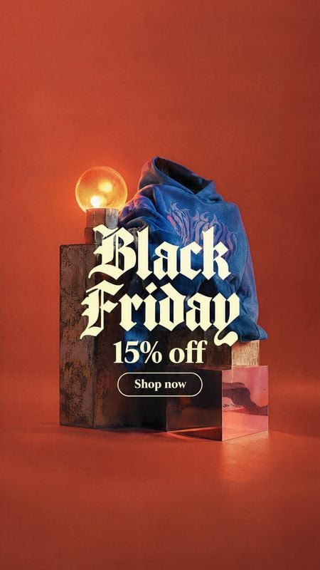 blue hoodie ghost mannequin product photo: A blue graphic hoodie is staged on sculptural blocks against a warm red-orange studio backdrop, with glowing amber l…