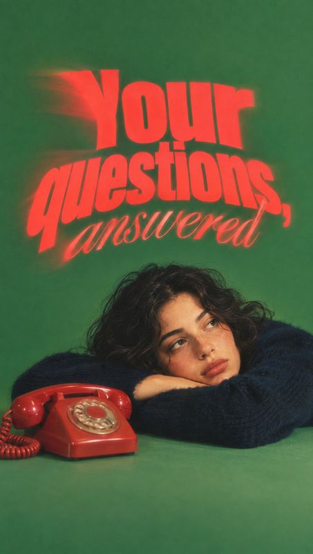vintage rotary telephone electronics product photo: A woman in a dark fuzzy sweater rests beside a red rotary telephone against a green studio backdrop, beneat…