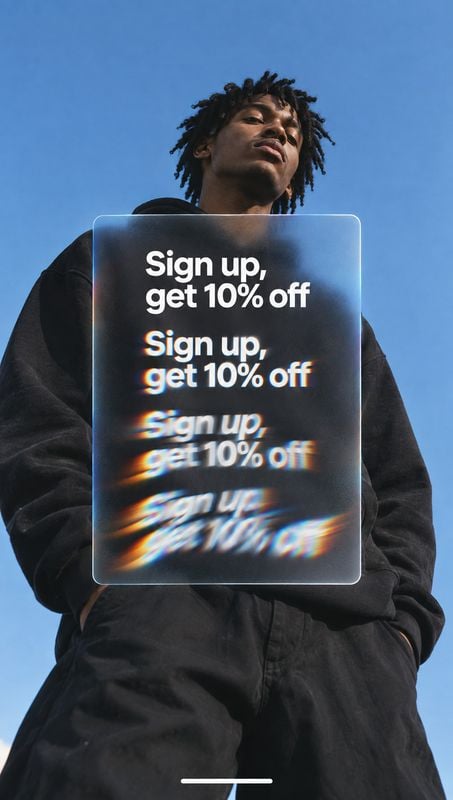 black coat black friday product photo: A model in an oversized black coat poses against a vivid blue sky behind a translucent panel with repeated, chromaticall…