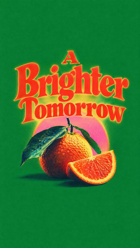 orange food and drink product photo: A vivid orange and cut citrus wedge sit against a saturated green background beneath glowing red-orange display lettering,…