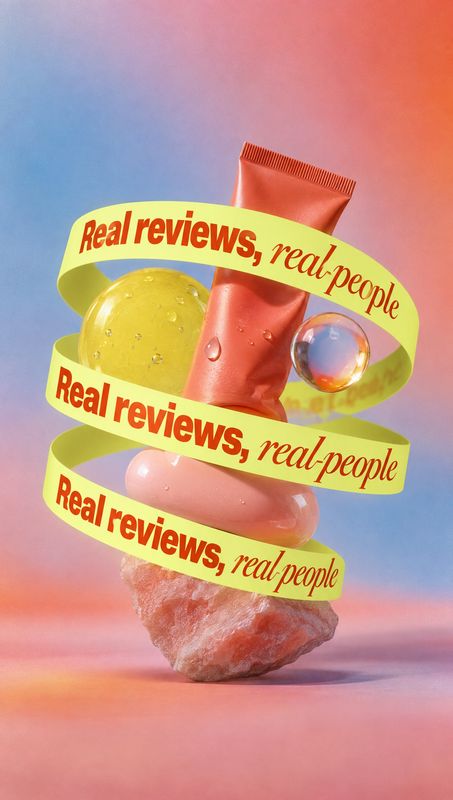 cosmetic tube floating product product photo: A coral cosmetic tube and glossy spheres float above a rough stone, wrapped in bright yellow ribbons reading “Rea…