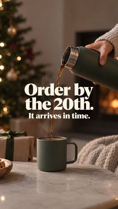 insulated flask splash / pour product photo: A hand pours coffee from a dark green insulated flask into a matching mug in a cozy Christmas-lit interior, with a…