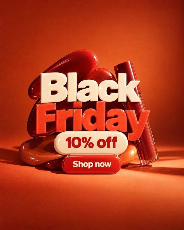lipstick texture / swatch product photo: Glossy red cosmetic tubes sit behind bold three-dimensional Black Friday lettering and a 10% off offer, set against a…