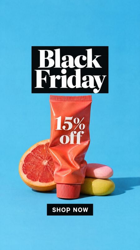 cosmetic tube ingredients product photo: A coral cosmetic tube sits among citrus and pastel props against a bright blue studio backdrop, with bold Black Friday…