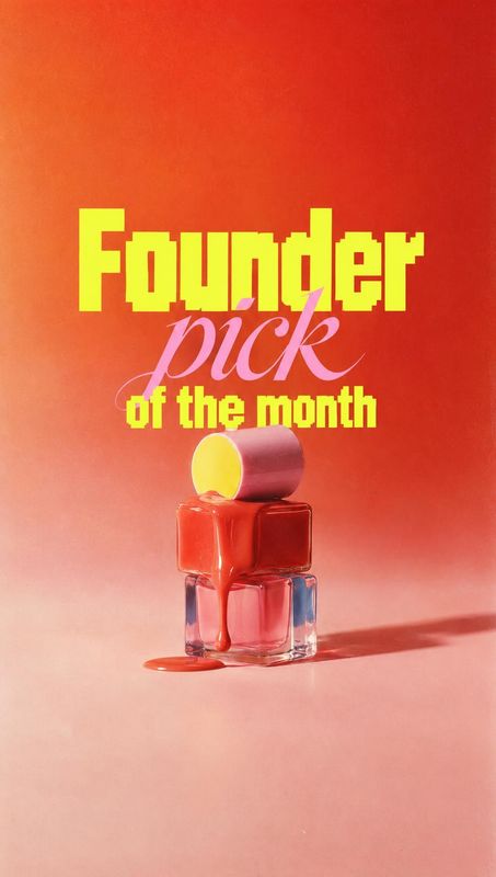 nail polish texture / swatch product photo: Stacked nail polish bottles, one spilling onto a glossy surface, sit against a warm red-to-pink studio backdrop ben…