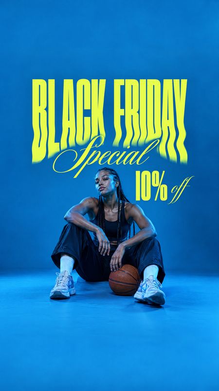 sneakers sports product photo: A seated basketball player in a black athletic outfit and white sneakers poses with a basketball against a vivid blue studio bac…