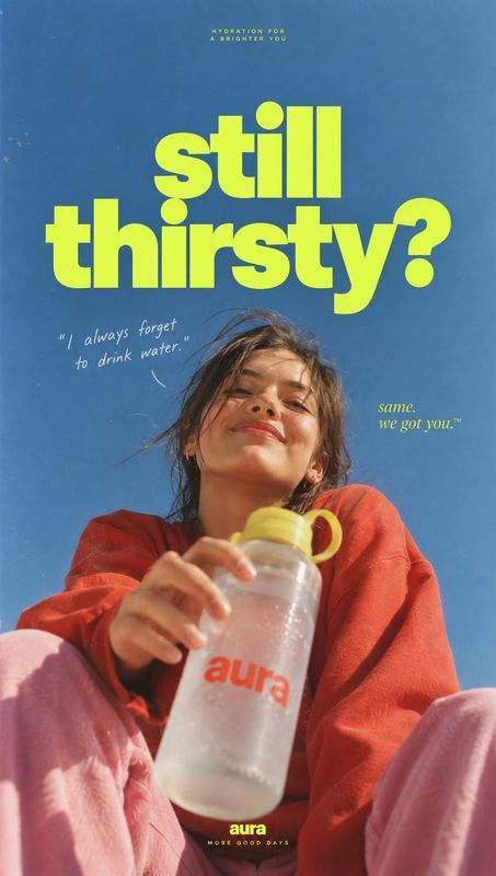 water bottle personal care product photo: A smiling young woman in a red sweatshirt holds a clear water bottle against a bright blue sky, with oversized neon-y…
