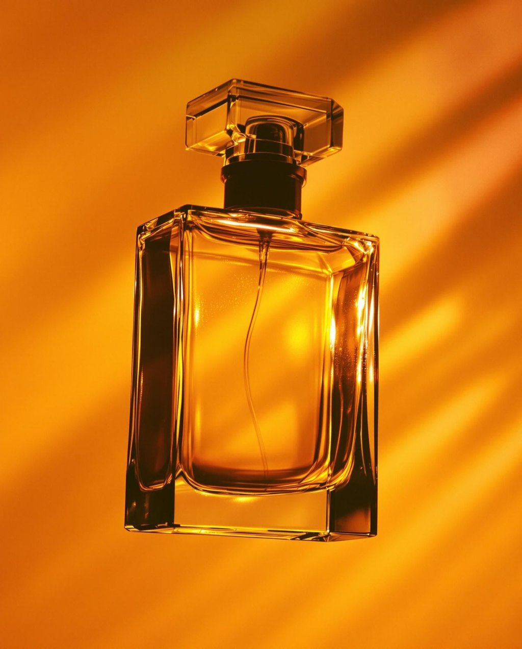 Perfume bottle in golden-hour light