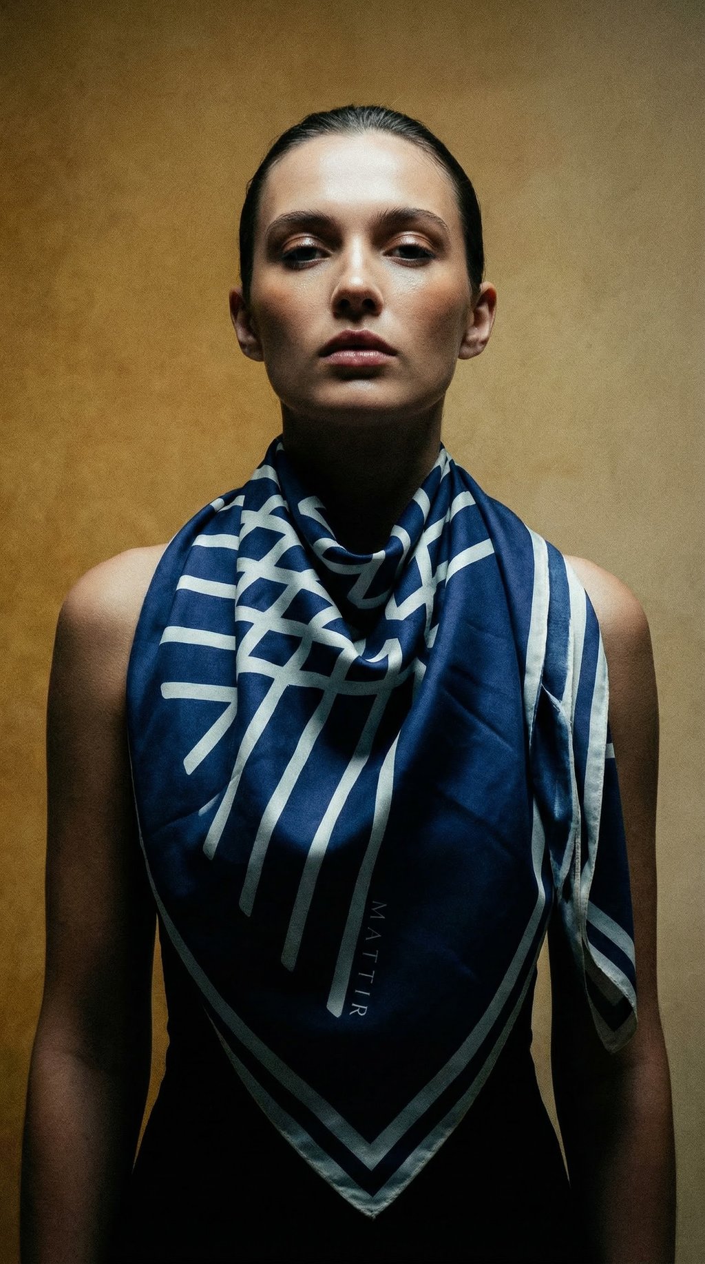AI product shot of MATTIR SCARF IN CHARCOAL