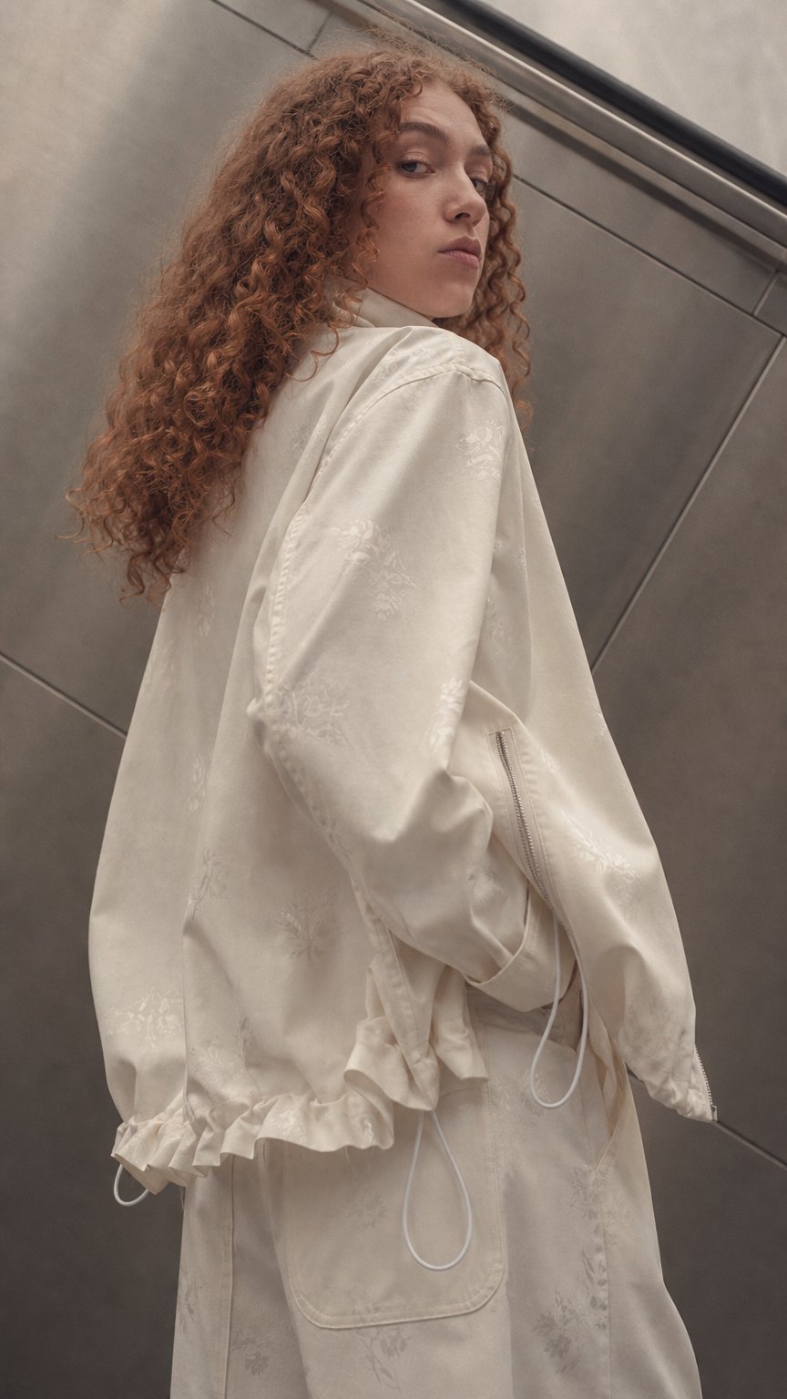 AI product shot of CF. EXCLUSIVES TRACK JACKET flower jacquard