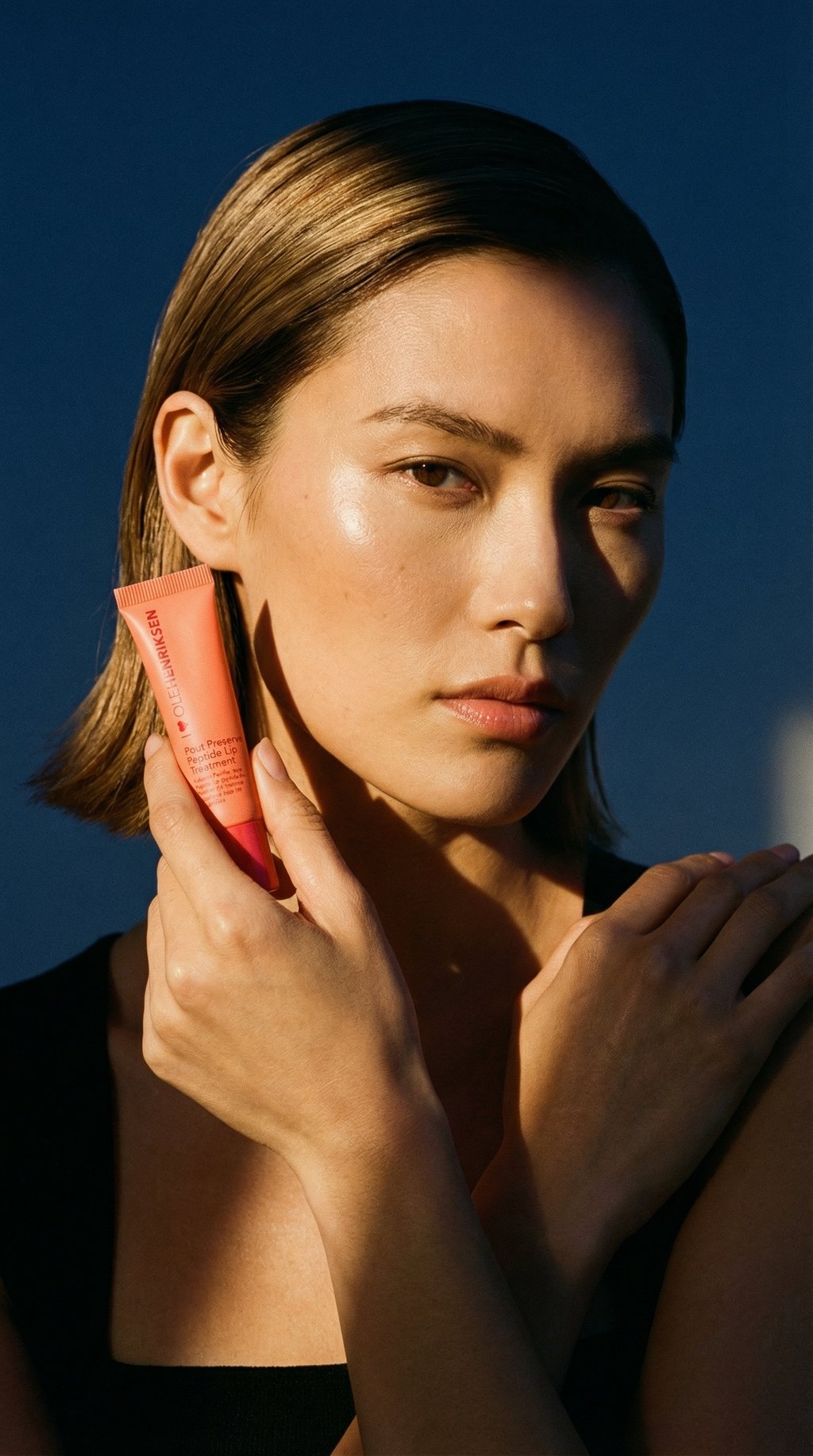 AI product shot of Ole Henriksen Pout Preserve Peptide Lip Treatment Strawberry