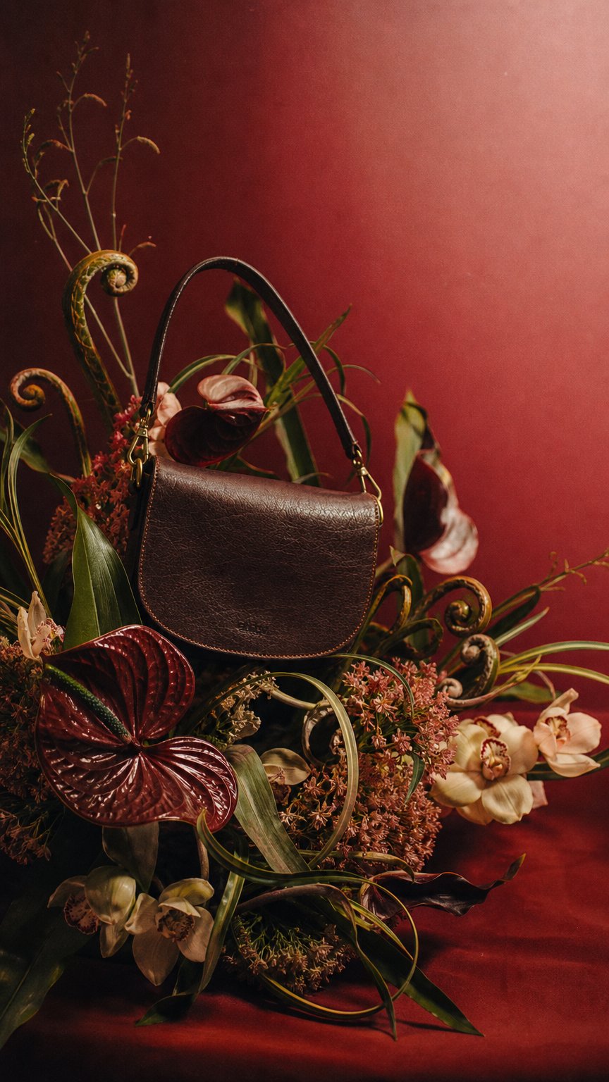 AI product shot of Embossed Heritage Collection Leather Crossbody Bag