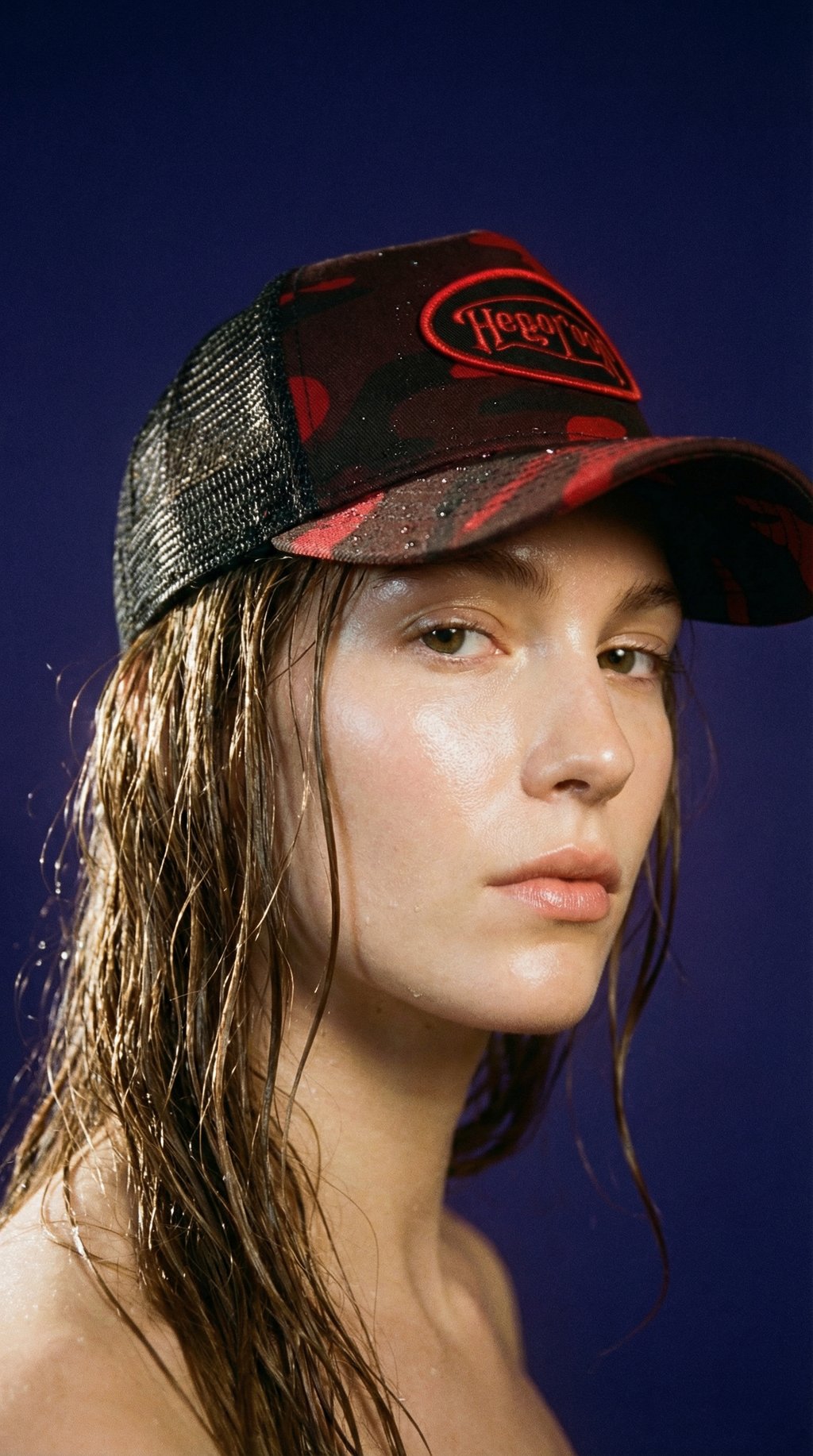 AI product shot of Von Dutch Red Rambo Camo Trucker Hat