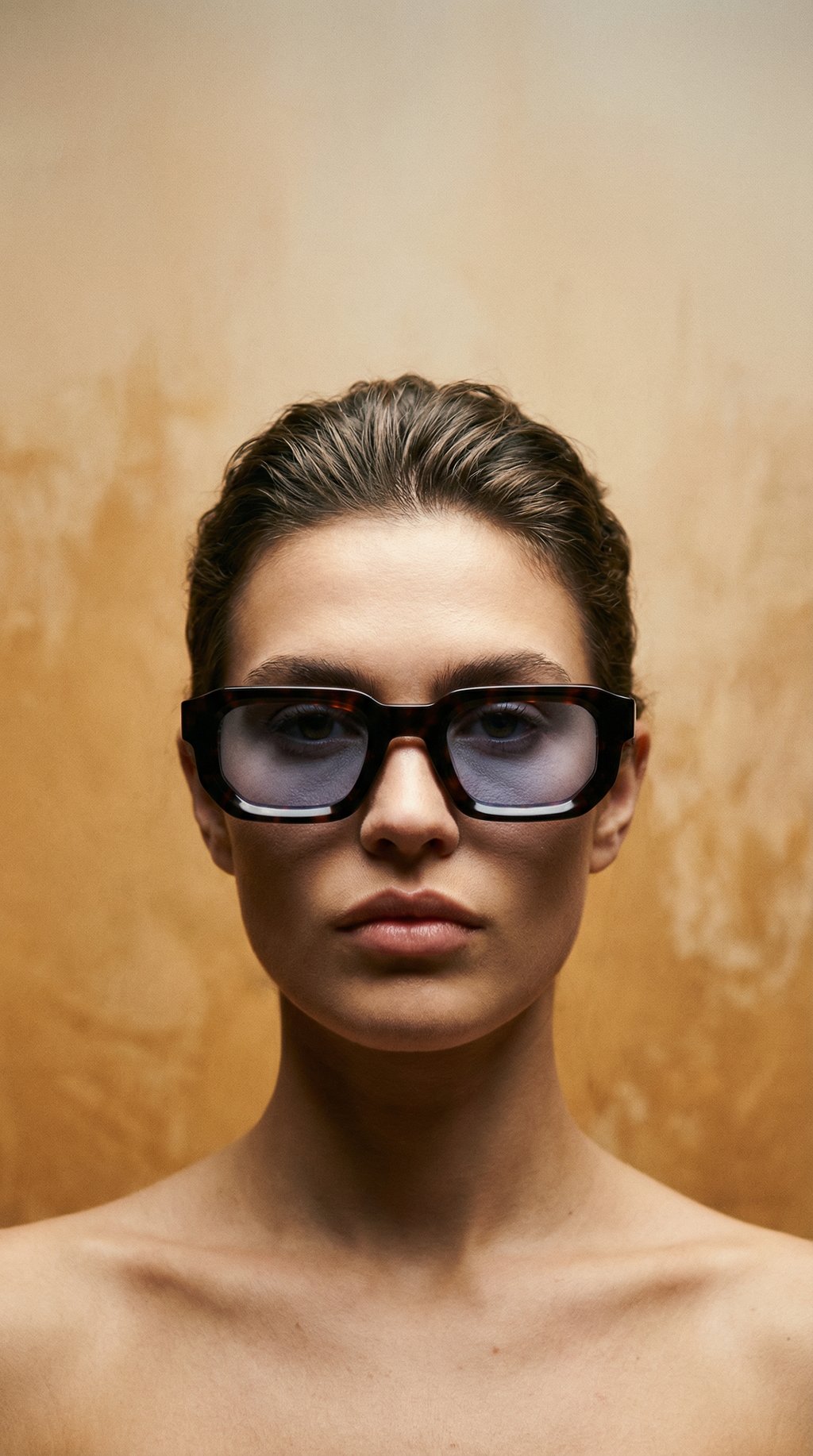AI product shot of milk* eyewear Jules Sunglasses - tortoise shell, Blue lens.