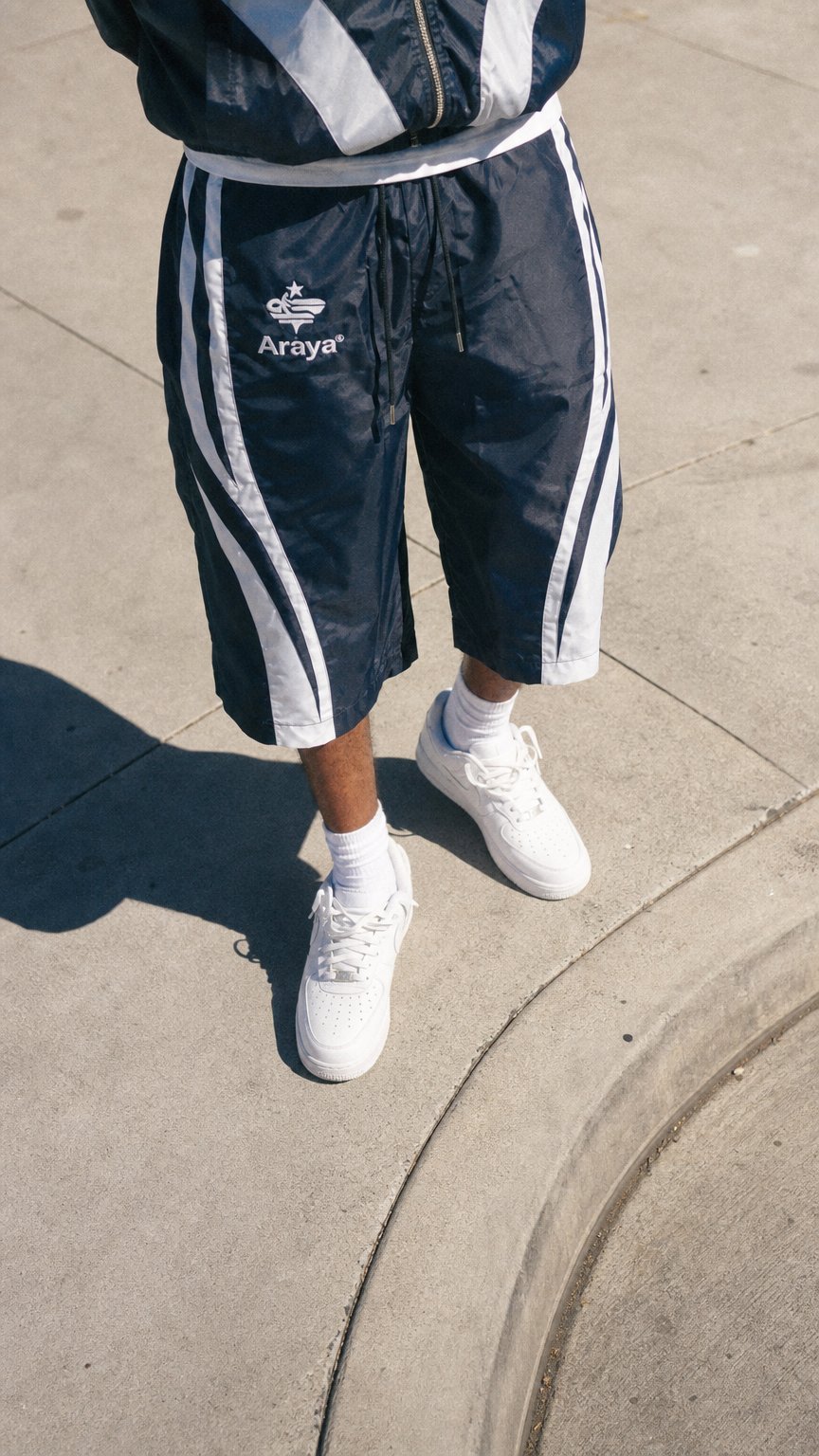 AI product shot of 3/4th Quarter Length "014" Navy Blue Short Set