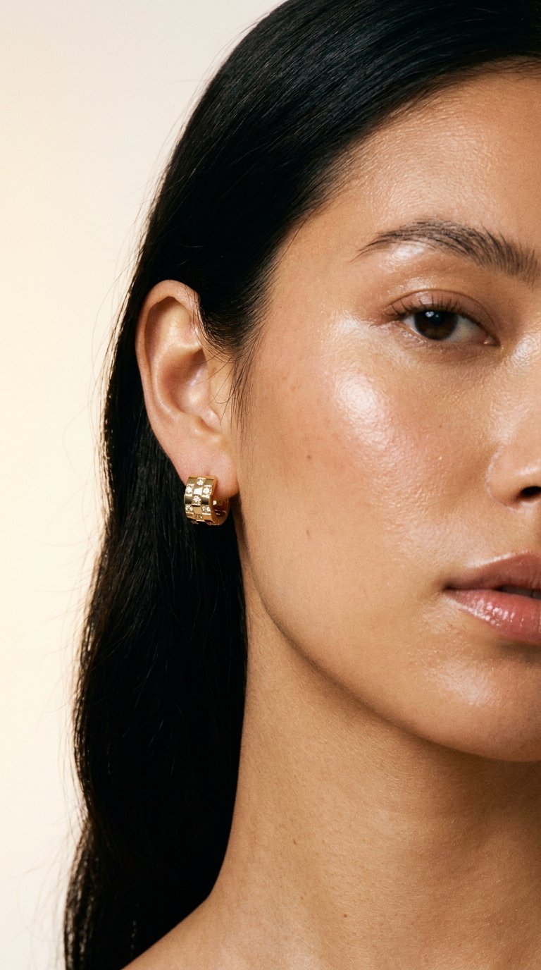 AI product shot of New York Gold Earrings