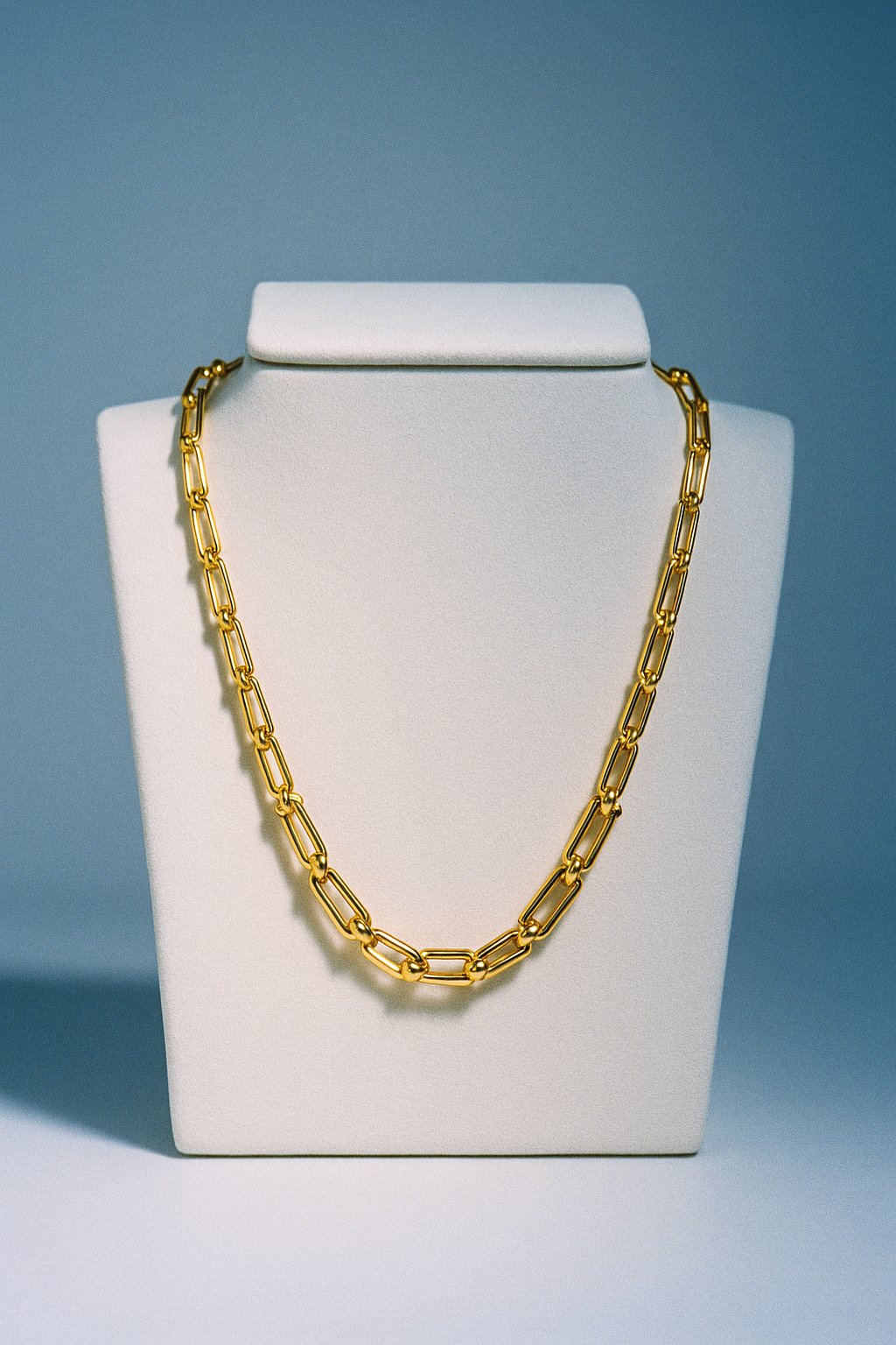 AI product shot of Tiffany HardWear Graduated Link Necklace in Yellow Gold
