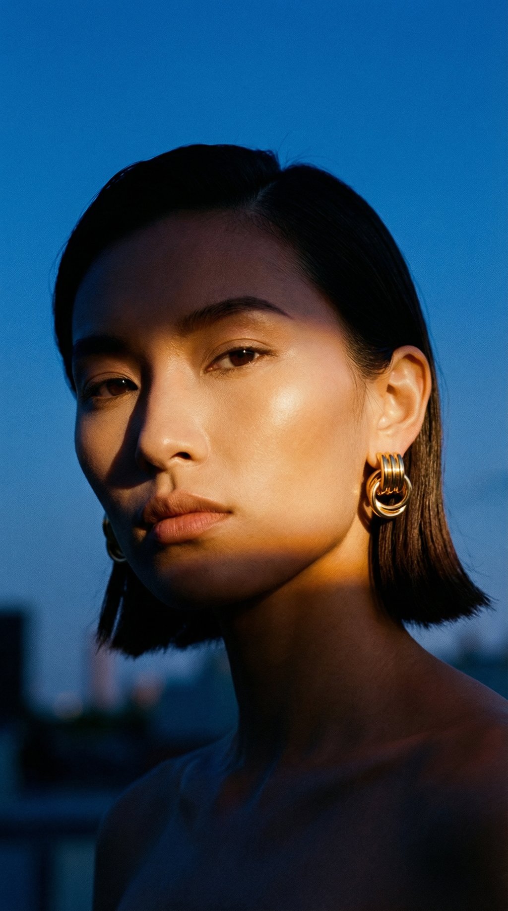 AI product shot of MINI KNOT EARRINGS