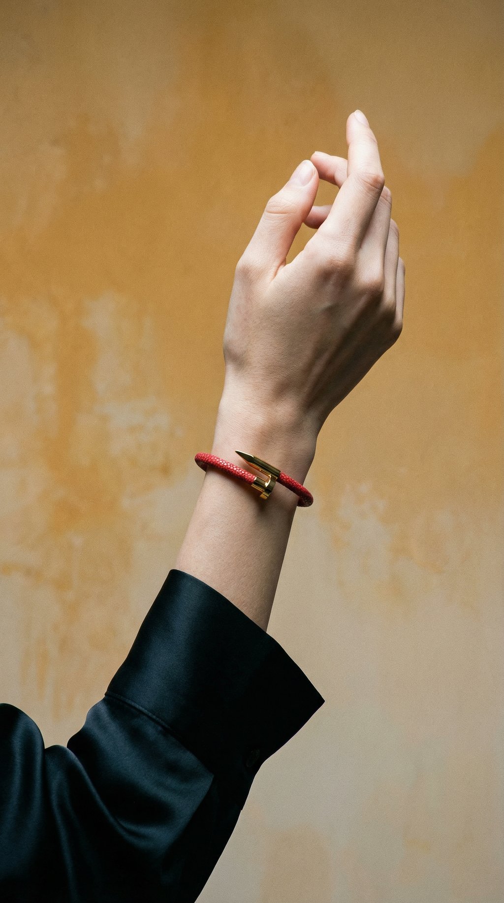 AI product shot of Red Stingray & Yellow Gold Nail - 17 cm (small)