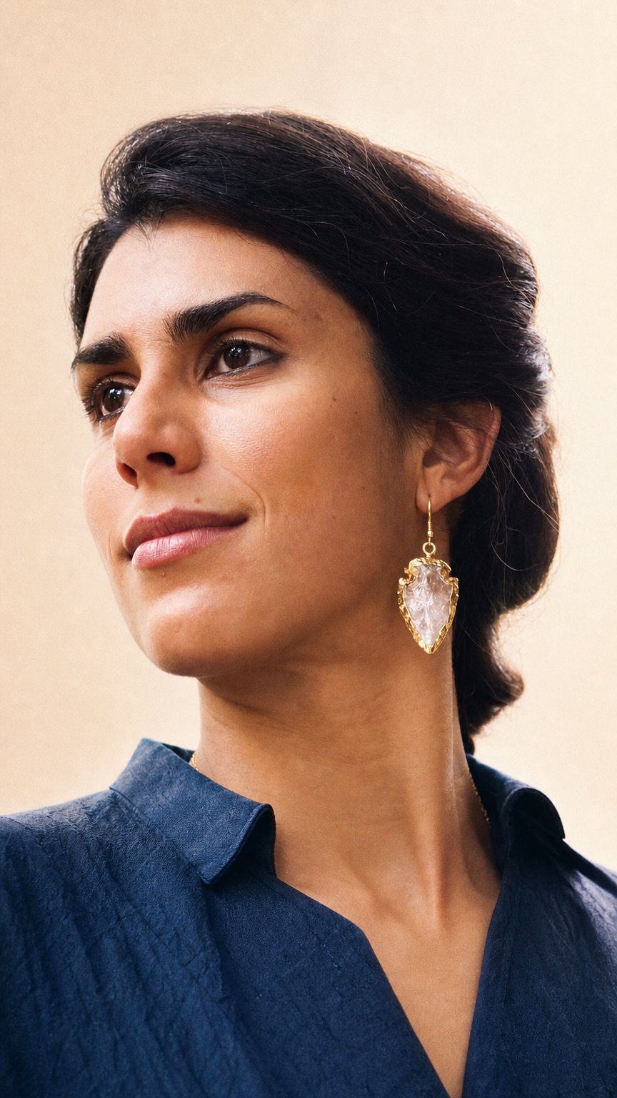 AI product shot of Abbakka Arrowhead Earrings - Crystal